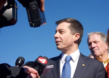 San Francisco, CA - Jan 23, 2023:  Transportation Secretary Pete Buttigieg speaking at a Press Conf in front of the GGB. Highlighting the fed governments investments in infrastructure. clipart
