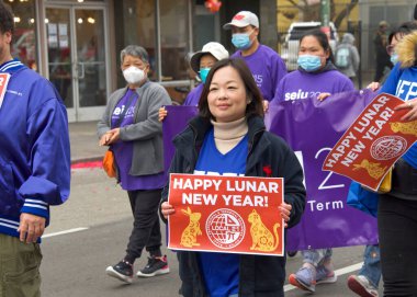 Oakland, CA - Jan 29, 2023: Participants in the first annual Lunar New Year Parade in Oakland.