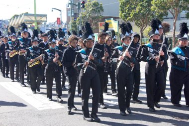San Francisco, CA - Feb 18, 2023: Phillip Burton HIgh School Puma Band in the Black History Parade, walking down 3rd Street in the Bayview Hunters Point neighborhood.