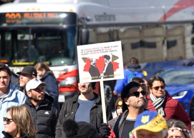 San Francisco, CA - Feb 25, 2023: Participants at Unite for Ukraine Rally at Harry Bridges Plaza on the Embarcadero, organized by the Ukrainian American Coordinating council.