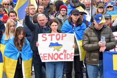 San Francisco, CA - Feb 25, 2023: Participants at Unite for Ukraine Rally at Harry Bridges Plaza on the Embarcadero, organized by the Ukrainian American Coordinating council.