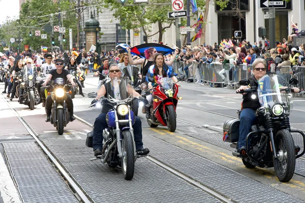 stock image San Francisco, CA - June 24, 2023: Dykes on bikes open  the SF Gay Pride Parade up Market  St to Civic Center. Theme, Looking Back, Moving Forward.