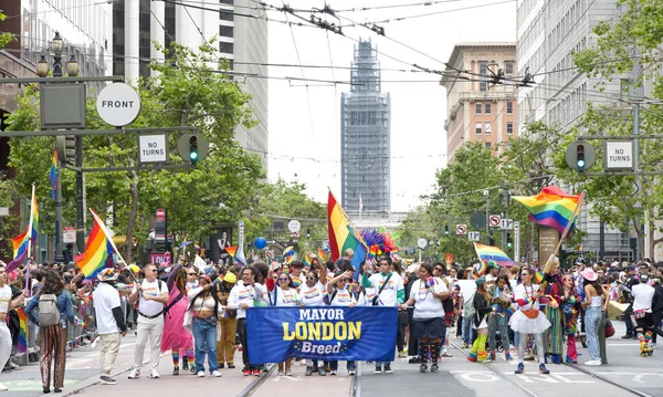 stock image San Francisco, CA - June 24, 2023: Participants celebrate at the SF Gay Pride Parade up Market  St to Civic Center. Theme, Looking Back, Moving Forward.