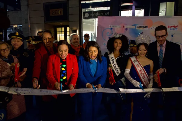 Stock image San Francisco, CA - Dec 15, 2023:  City and State officials at Union Square at the Winter Walk Ribbon Cutting Ceremony, cutting the ribbon.