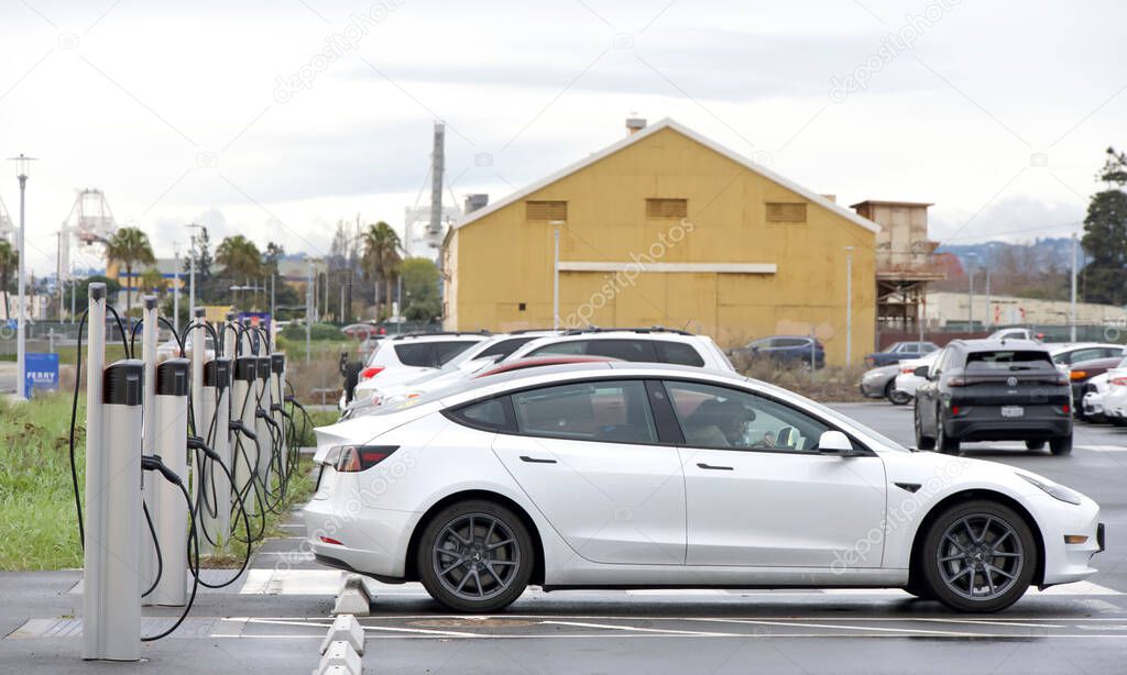 Alameda, CA - Dec 20, 2023: Charge Point EV Charging Station in the Sea Plane Lagoon Ferry Terminal Parking lot. The world's largest network of EV charging stations in North America and Europe.