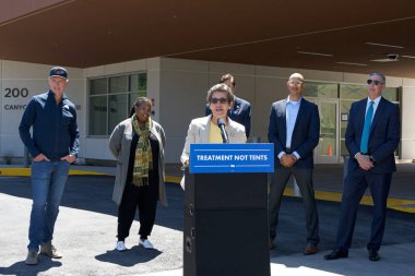 Redwood City, CA - May 14, 2024: State Senator Susan Talamantes Eggman speaking at a press conf on updating the states efforts to transform the Mental Health System. clipart
