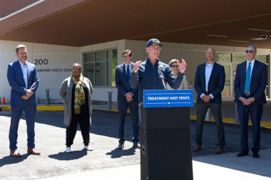 Redwood City, CA - May 14, 2024: Governor Gavin Newsom speaking at a press conf on updating the states efforts to transform the Mental Health System. clipart