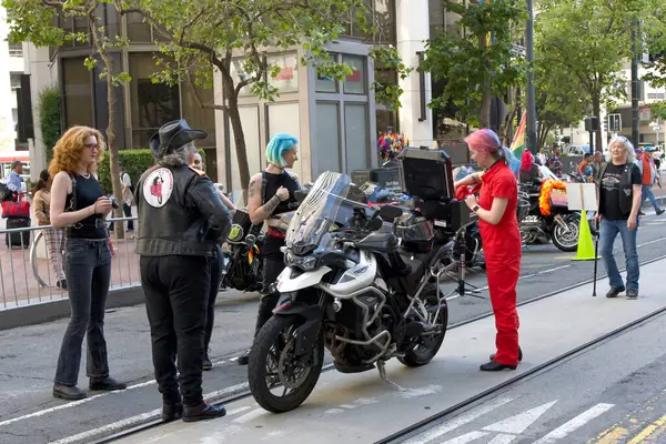 Stock image San Francisco, CA - June 30, 2024:  Dykes on Bikes preparing to kick off the 54th annual Gay Pride Parade going up Market. This years theme, Beacon of Love