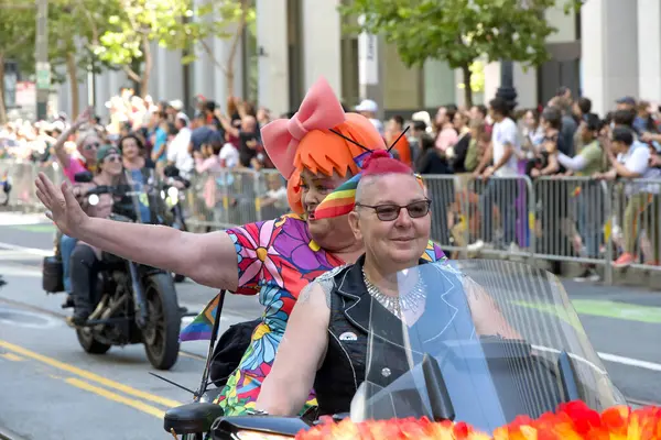 stock image San Francisco, CA - June 30, 2024:  Dykes on Bikes kicking off the 54th annual Gay Pride Parade going up Market. This years theme, Beacon of Love.