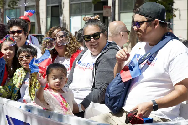 stock image San Francisco, CA - Aug 10, 2024: Participants in the 31st annual Pistahan Parade, a colorful display of Filipino community pride and diversity.