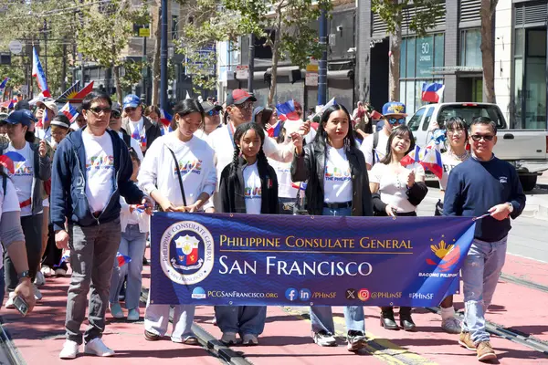 stock image San Francisco, CA - Aug 10, 2024: Participants in the 31st annual Pistahan Parade, a colorful display of Filipino community pride and diversity.