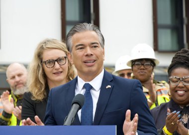 San Francisco, CA - Sept 19, 2024:  Attorney General Rob Bonta speaking at a press event signing legislation to take action on housing and homelessness and announcing funding clipart