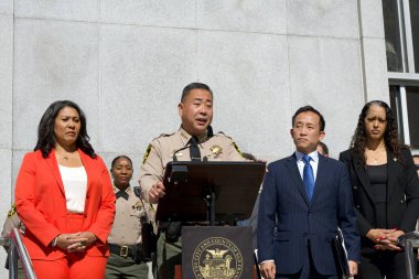 San Francisco, CA - Oct 3, 2024: Sheriff Paul Miyamoto speaking at a Press Conf on the steps of the Hall of Justice re legal challenges with the Pre-Trial Electronic Monitoring Program clipart