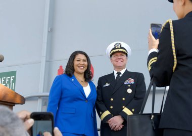 San Francisco, CA - Oct 8, 2024: Rear Admiral Brad Rosen, posing for photos with Mayor London Breed at the 43rd Annual Fleet Week Opening Ceremony  clipart