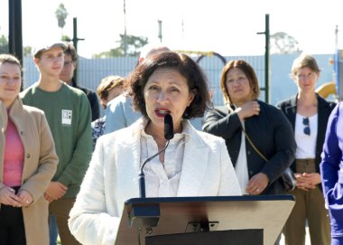 San Francisco, CA - Oct 11, 2024: Supervisor Myrna Melgar speaking at a Press Conf on the City's implementing of the safety upgrades as part of the West Portal Station Safety project. clipart