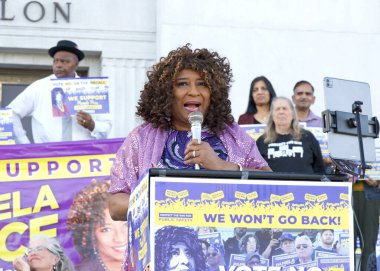 Oakland, CA - Oct 20, 2024: Alameda County District Attorney Pamela Price speaking outside the Alameda County Courthouse at a Rally to Protect the win, vote no on the recall initiative. clipart