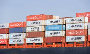 Oakland, CA - Nov 1, 2024:  Shipping containers stacked on Liberian cargo ship UTE.  clipart