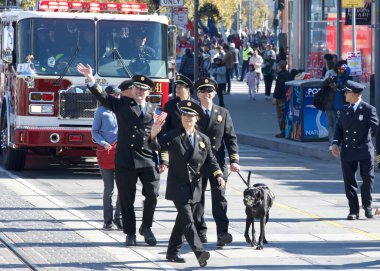 San Francisco, CA - Nov 10, 2024: Unidentified participants in the Veterans Day Parade in downtown San Francisco. This years theme, a Legacy of Loyalty and Service. clipart