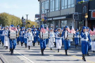 San Francisco, CA - Nov 10, 2024: Unidentified participants in the Veterans Day Parade in downtown San Francisco. This years theme, a Legacy of Loyalty and Service. clipart