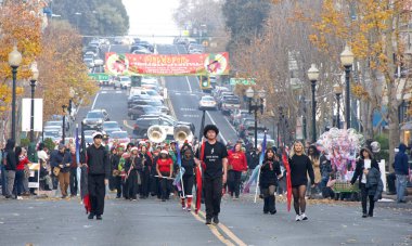 Vallejo, CA - Dec 07, 2024: Participants in the 15th annual Mad Hatter Parade. Californias most whimsical holiday event and as a top ten holiday attraction in Northern CA.  clipart