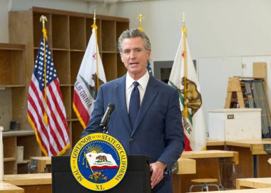 Turlock, CA - Jan 6, 2025: CA Governor Gavin Newsom speaking at a press conference regarding the California Jobs First project and previewing budget top lines for the upcoming fiscal year clipart