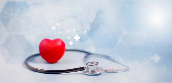Concept stethoscope and red heart with Health insurance, doctor stethoscope and red heart check heart health care, instrument for checking heart on the white background represents exercise, isolated