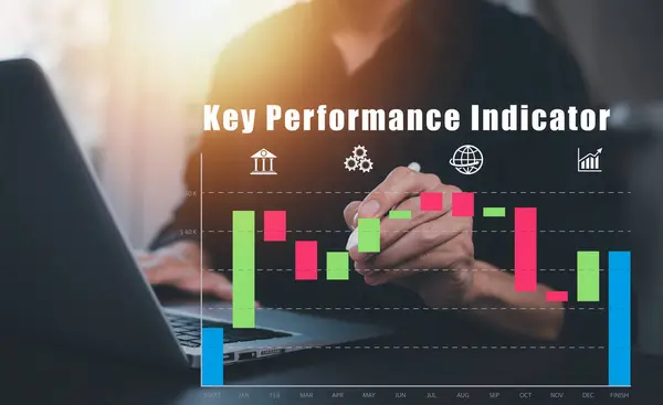 Key Performance Indicator (KPI)  Company Management Business Internet Technology Concept, Man using a laptop with Key performance indicator business plan, Measure achievement versus planned target.