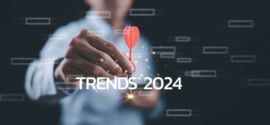 Yeni planlamada değişiklikler, 2024 yeni yıldaki eğilimlerle el ele tutuşmalar, yeni yıl konsepti hedefleri dijital trendler, endüstri ve iş trendi, strateji, yatırım, iş planlaması ve mutlu yıllar 