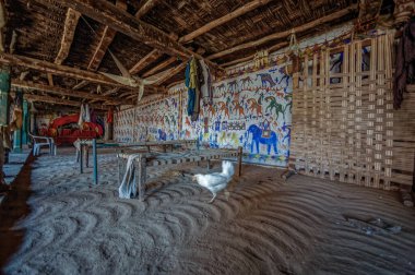11 26 2009 Pithora paintings on interior wall of Rathwa tribal home near Jambughoda, Gujarat, India 