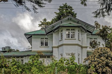 09 07 2007 Exterior of an Vintage old Villa in a tropical garden,Sri Lanka. Asia, 