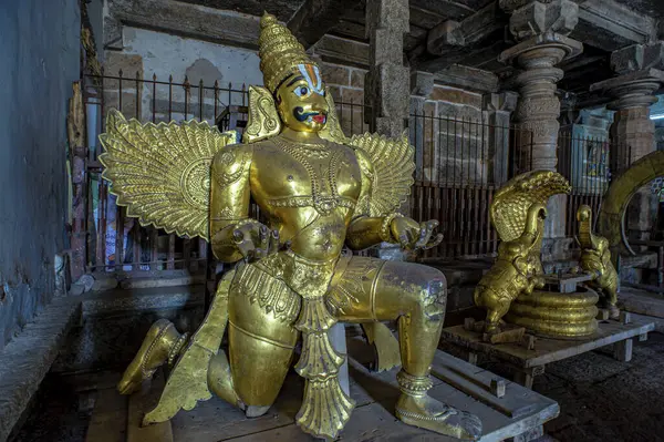 stock image 10 31 2009 Vintage Golden statue of Garuda, Vishnu's man-bird vehicle, Ranganathaswamy Temple, Srirangapatna,Mysore  Karnataka, India Asia