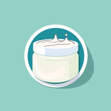 Yeşil arka planda bir kavanoz krema.