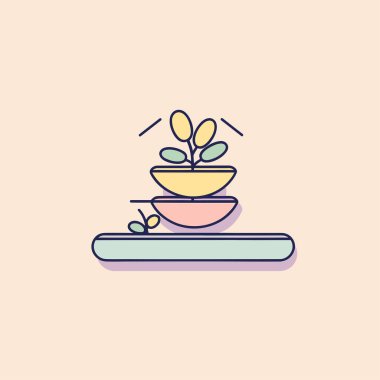 Üstünde bitki olan bir kase.