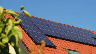 New ecologic house with solar panels Alternative to conventional energy. The battery is charged from a solar cell Advertisement Green energy Sustainable life Renewable alternative energy 