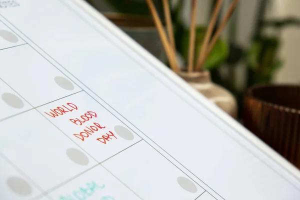 WORLD BLOOD DONOR DAY on calendar to remind important event or holiday appointment Monthly PLANNER. Magnetic board with the days of the month. Place to enter important matters schedule. Concept for