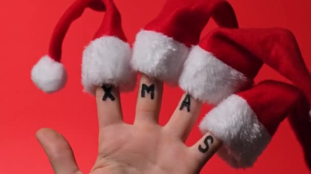 Dedos Vestidos Con Sombreros Rojo Blancos Santa Claus Texto Palabras — Vídeo de stock