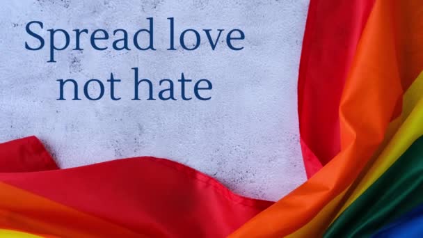 Zoom Out Bandeira Arco Íris Com Texto Spread Love Hate — Vídeo de Stock