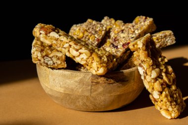 Homemade natural Granola energy bar. Variety of homemade Protein granola breakfast bars with nuts, raisins dried cherries and chocolate. Healthy nutrition eating. Gluten free cereal dieting snack