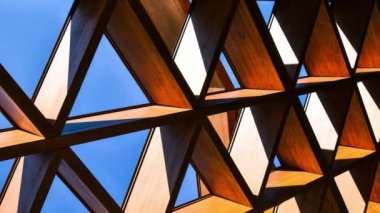 4k zoom in out Roofing Construction. Wooden Roof Frame House Construction. Abstract Structure background. Wood texture pattern. Architecture minimal concept. Visual art. Conceptual