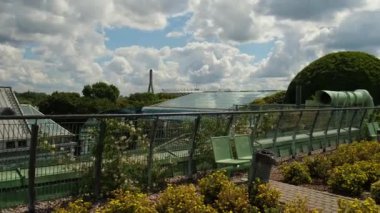 Botanical garden on the roof of the Warsaw University library modern architecture and greenery. One of the largest roof gardens in Europe. Ecological modern building. Modern garden with plants and