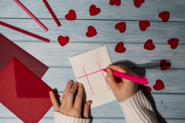 Valentines Day. Instructions for making valentine cards. Text YOU WON MY HEART and tic tac toe game Postcard craft, greeting card. DIY Step by step instruction. Making of handmade Valentine greeting