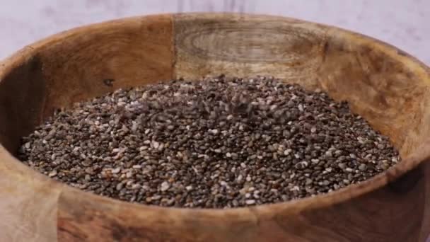 Slow Motion Chia Seeds Fall Wooden Bowl Healthy Superfood Rich — Stock video