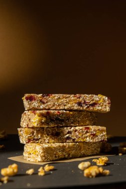 Homemade natural Granola energy bar. Variety of homemade Protein granola breakfast bars with nuts, raisins dried cherries and chocolate. Healthy nutrition eating. Gluten free cereal dieting snack