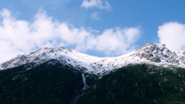 Winter snowy mountain peaks. Snow-covered mountains in Zakopane, Poland. Majestic Mountain Peaks Golden Hour Winter Wonderland. Idyllic arctic landscape. Adventure, travel background concept. 