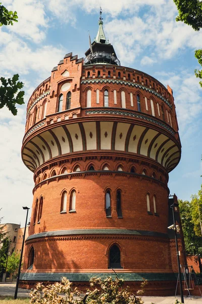 Old brick water tower in Bydgoszcz. The Water Tower in Bydgoszcz, Poland, historic city landmark and viewpoint, Neo-Gothic architecture Poland