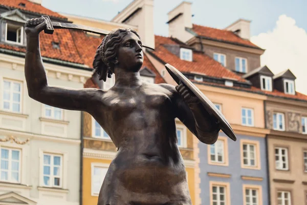 stock image The Statue of Mermaid of Warsaw, Polish Syrenka Warzawska, symbol of Warsaw in the Old Town Market Square. Travel attraction tourist destination