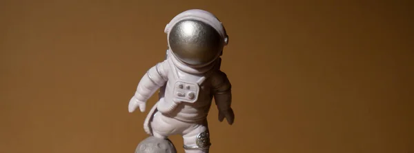 Plastic Toy Figure Astronaut Beige Neutral Background Copy Space Concept — Stock Photo, Image