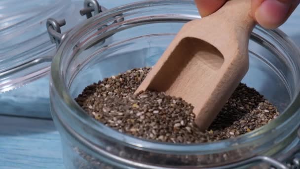 Slow Motion Chia Seeds Fall Glass Jar Healthy Superfood Rich — Αρχείο Βίντεο
