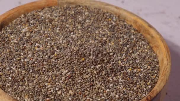 Slow Motion Chia Seeds Fall Wooden Bowl Healthy Superfood Rich — Vídeos de Stock