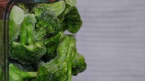 Unrecognizable Woman Showing Camera Frozen Food Broccoli Florets Homemade Vertical — Stock Video